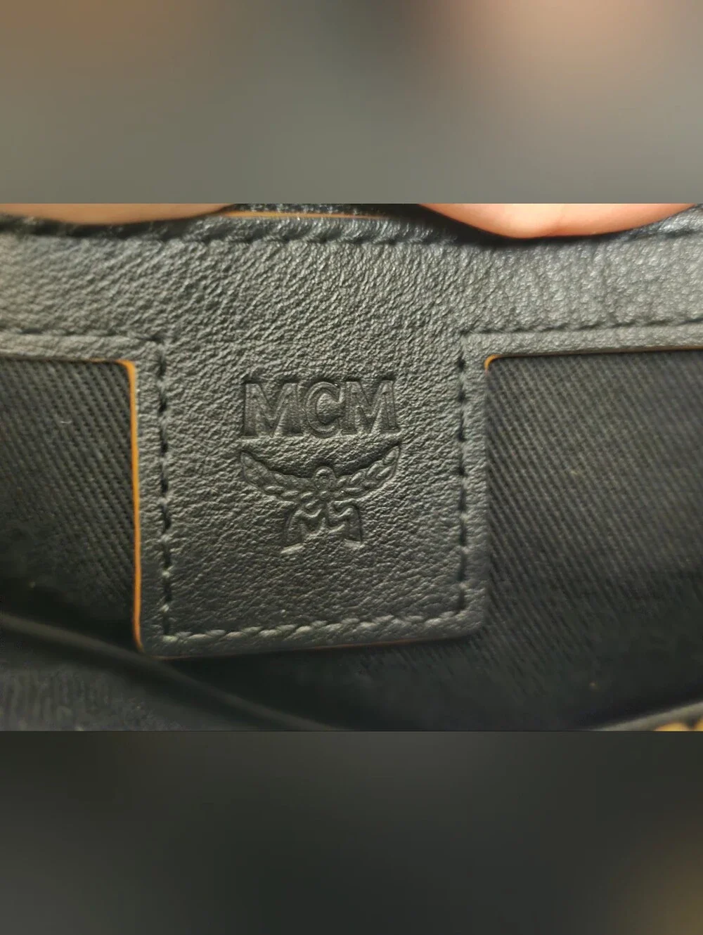 MCM Black Leather Embossed Crossbody with Tan Strap